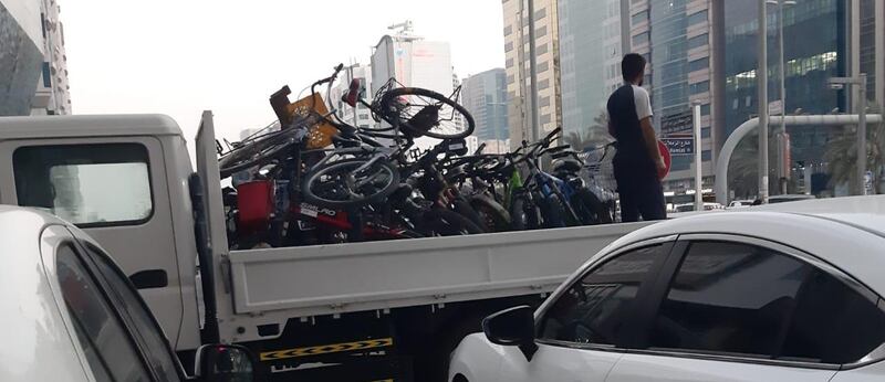 Bicycles confiscated by police are piled high in a lorry in this picture taken by one owner.