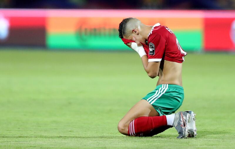 Soccer Football - Africa Cup of Nations 2019 - Round of 16 - Morocco v Benin - Al Salam Stadium, Cairo, Egypt - July 5, 2019  Morocco's Faycal Fajr looks dejected after the match       REUTERS/Suhaib Salem