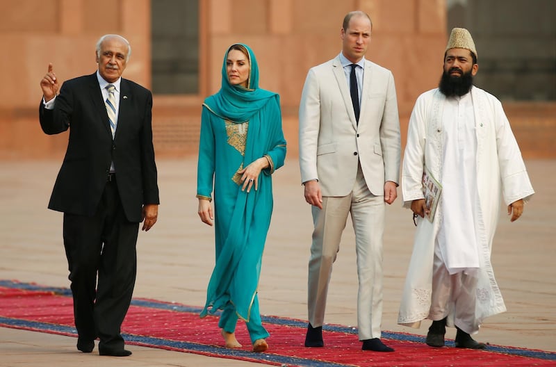 Britain's Prince William and Catherine, Duchess of Cambridge are escorted into the Badshahi Mosque in Lahore, Pakistan October 17, 2019. REUTERS/Peter Nicholls
