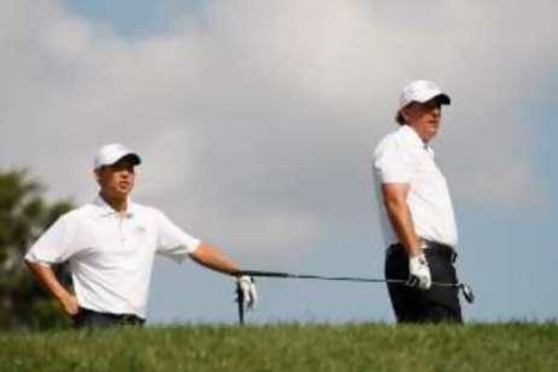 Phil Mickelson (R) and Anthony Kim, members of the U.S. Ryder Cup team, look down the fairway during practice for the 37th Ryder Cup Championship at the Valhalla Golf Club in Louisville, Kentucky September 16, 2008.     REUTERS/Shaun Best (UNITED STATES) *** Local Caption ***  RYD32_GOLF-RYDER-_0916_11.JPG