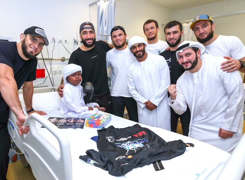 The fighters with Mohamed Abdul Aziz at the Al Jalila Children's Hospital in Dubai.