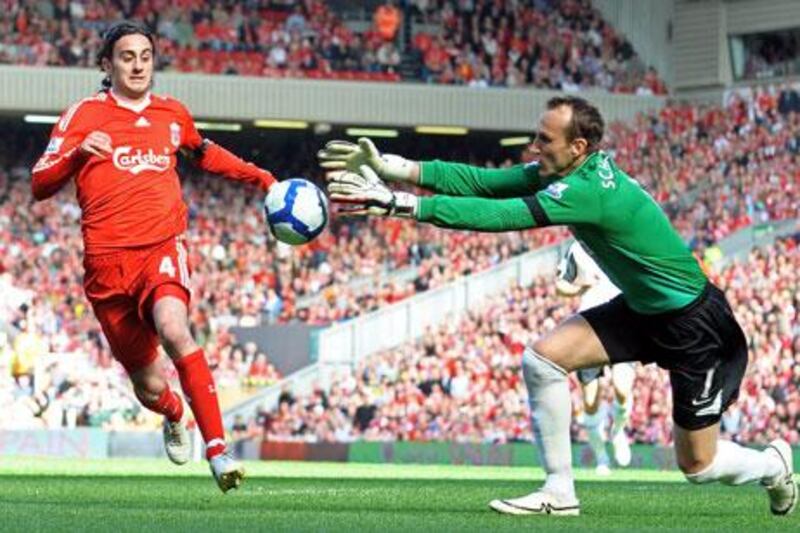 Alberto Aquilani has a shot saved by Fulham goalkeeper Mark Schwarzer during a rare outing in Liverpool colours