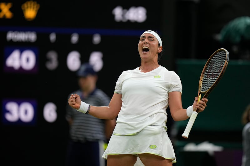 Ons Jabeur celebrates after beating Bianca Andreescu in the Wimbledon third round. AP