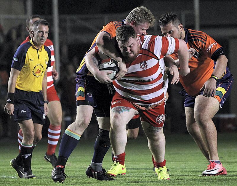 Sharjah, June, 01, 2018: RAK Rugby ( Red& White ) and  Arabian Knights ( Orange& BlacK) in action during the Nick Young Memorial match at the Sharjah Wanderers sports club in Sharjah . Satish Kumar for the National / Story by Paul Radley
