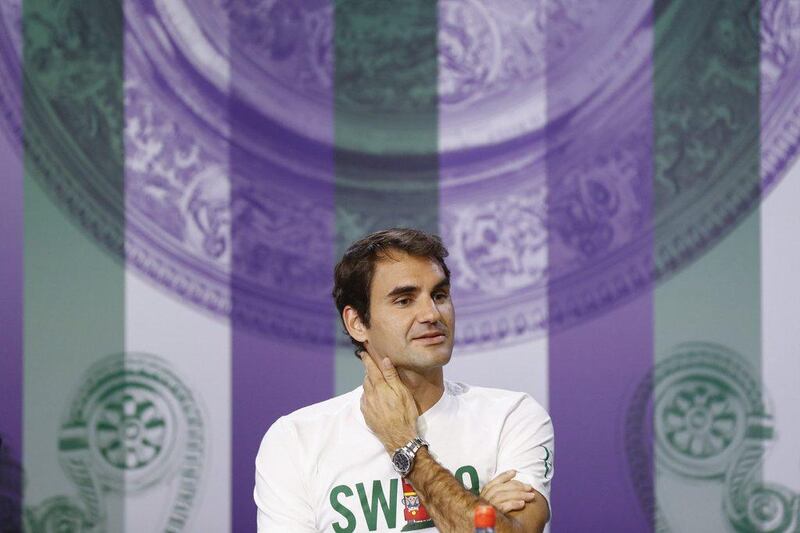 Roger Federer of Switzerland addresses media at a press conference ahead of the 2016 Wimbledon championship. Peter Klaunzer / EPA / June 25, 2016  