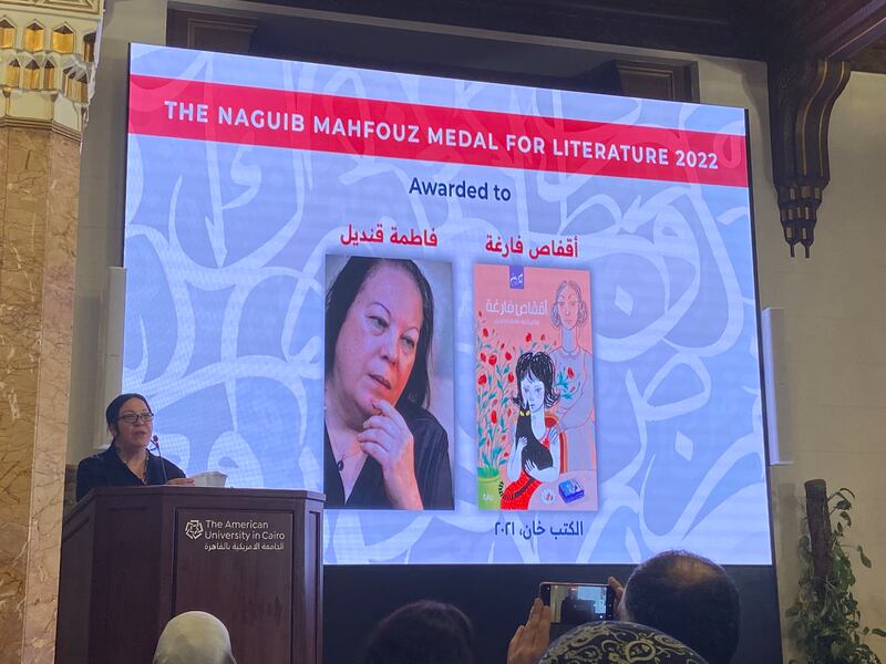 Fatma Qandil receives the Naguib Mahfouz Medal for Literature for her novel Aqfas Farigha (Empty Cages). Nada El Sawy / The National