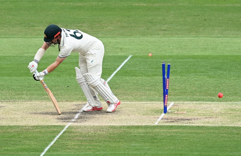 Travis Head is bowled by Shamar Joseph for the second golden duck of the Test. EPA