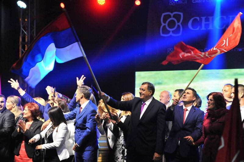 President of Bosnia and Herzegovina's entity Republika Srpska, Milorad Dodik acknowledges supporters during his address at a rally in Bosnian Serb stronghold town of Pale near Sarajevo, late on September 25, 2016, declaring that referendum held during the day was successful.  
Serbs in Bosnia voted on whether to keep celebrating a statehood day in January, a date tied to the fragile nation's brutal 1990s war and a sensitive issue for other ethnic groups. The poll was the brainchild of Milorad Dodik, nationalist leader of the Bosnian Serb-run entity Republika Srpska (RS), which partners the Muslim-Croat Federation in the divided country.
 / AFP PHOTO / ELVIS BARUKCIC