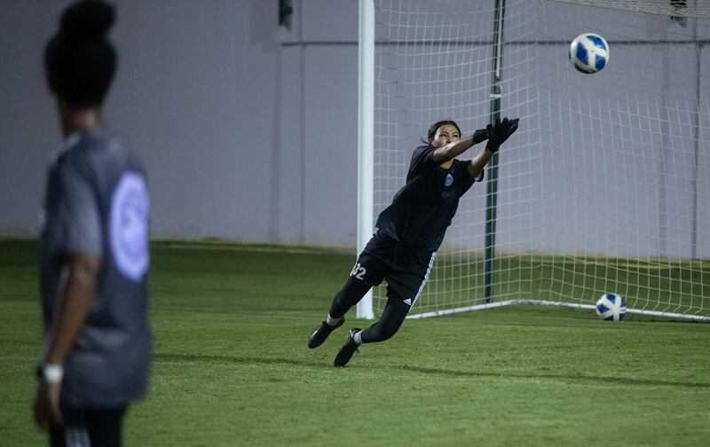 Banaat FC goalkeeper makes a save during training.