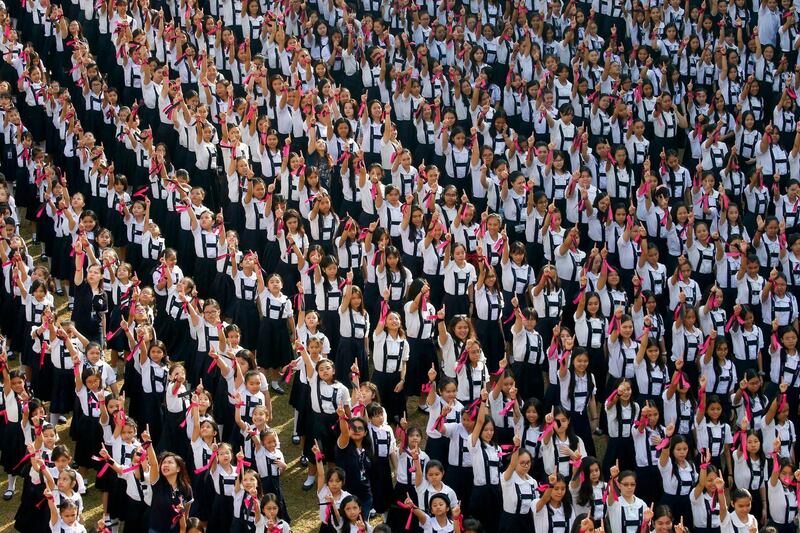 Thousands of students from the St. Scholastica's College take part in  a mass dance, dubbed "One Billion Rising", a global movement to help eradicate violence against women and children. AP Photo