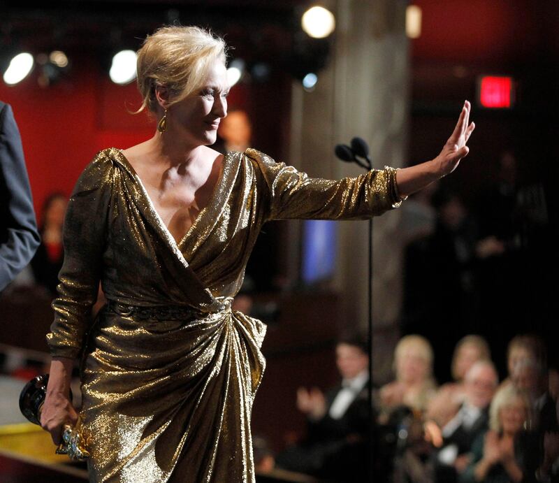Meryl Streep gestures as she accepts the Oscar for best actress in a leading role for "The Iron Lady" at the 84th Academy Awards on Sunday, Feb. 26, 2012, in the Hollywood section of Los Angeles. (AP Photo/Chris Carlson)