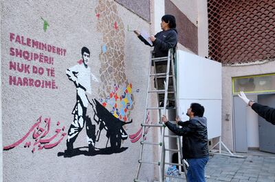 The mural calls on Afghans not to forget their brethren. Photo: AP