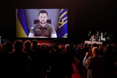 Ukraine's President Volodymyr Zelensky appeared on a screen during the opening ceremony of the 2022 festival. EPA