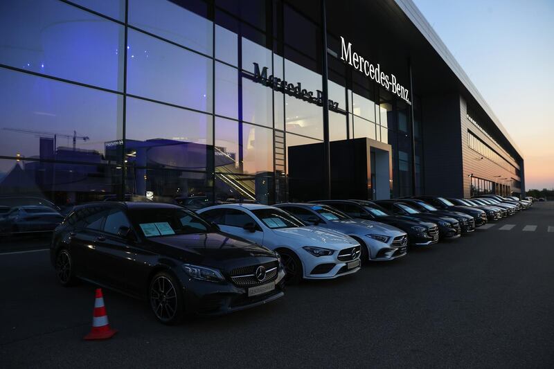 New Mercedes-Benz AG automobiles outside a Daimler AG showroom, at dusk in Frankfurt, Germany, on Tuesday, April 20, 2021. Daimler report first quarter earnings on April 23. Photographer: Alex Kraus/Bloomberg