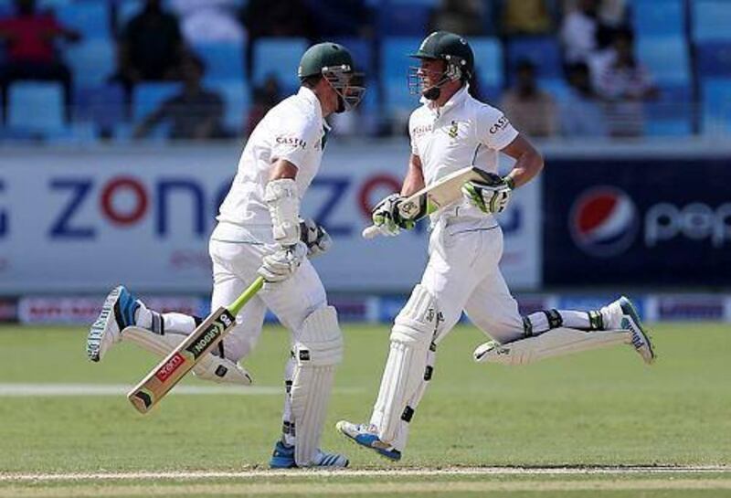 Graeme Smith, left, and AB de Villiers piled on the runs against a toothless Pakistan attack. Pawan Singh / The National 