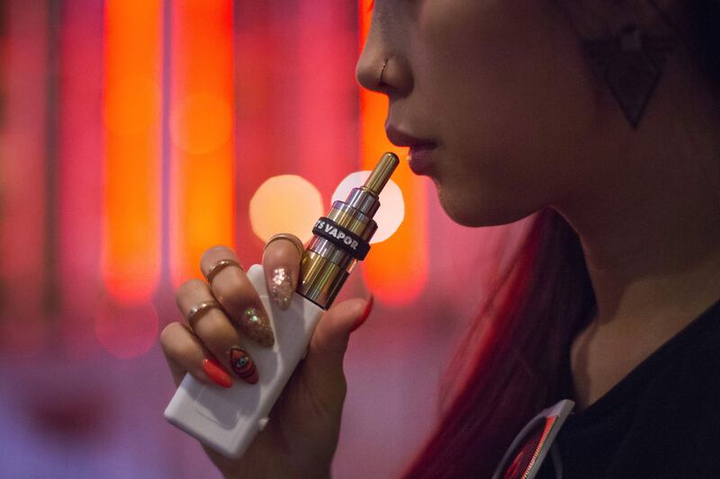 Many people have embraced e-cigarettes, with which vapour, not smoke, is inhaled. Elizabeth Shafiroff / Reuters