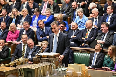 Chancellor of the Exchequer Jeremy Hunt delivering his 2024 budget to the House of Commons. By scrapping non-dom tax status, Mr Hunt may have given a boon to British expats. PA