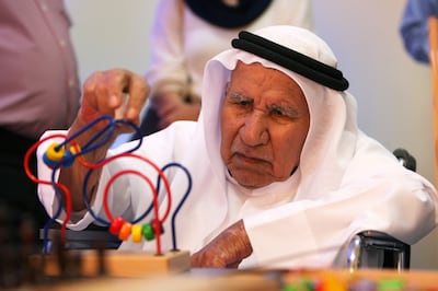 AJMAN , UNITED ARAB EMIRATES Ð May 12 , 2013 : Ali Abdul Karim playing puzzle game after the inauguration of Ô Brain Exercise room Õ at the Elderly Nursing home in Ajman. ( Pawan Singh / The National ) For News. Story by Yasin

