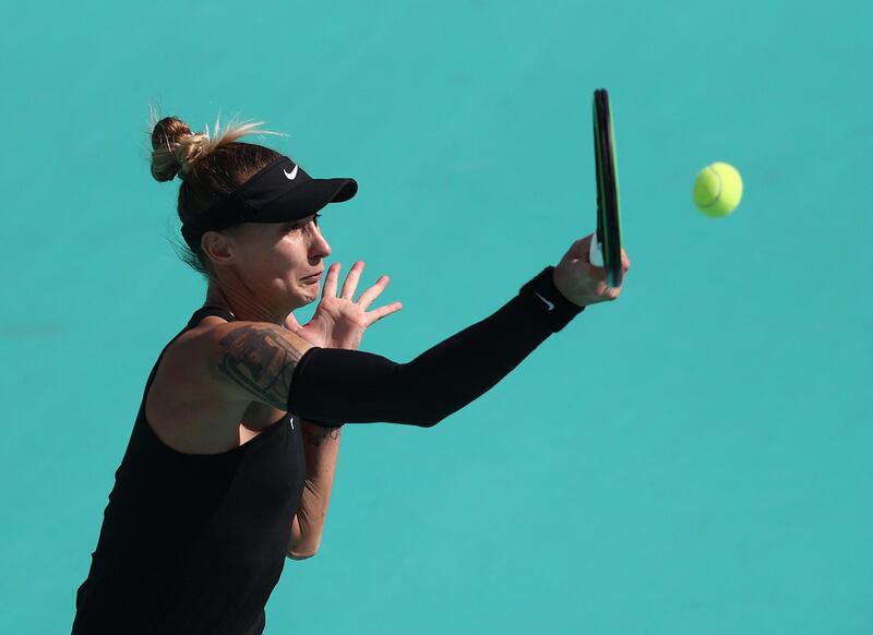 Polona Hercog of Slovenia plays a forehand against Aryna Sabalenka of Belarus during their Women's Singles match on Day Two of the Abu Dhabi WTA Women's Tennis Open. Getty Images