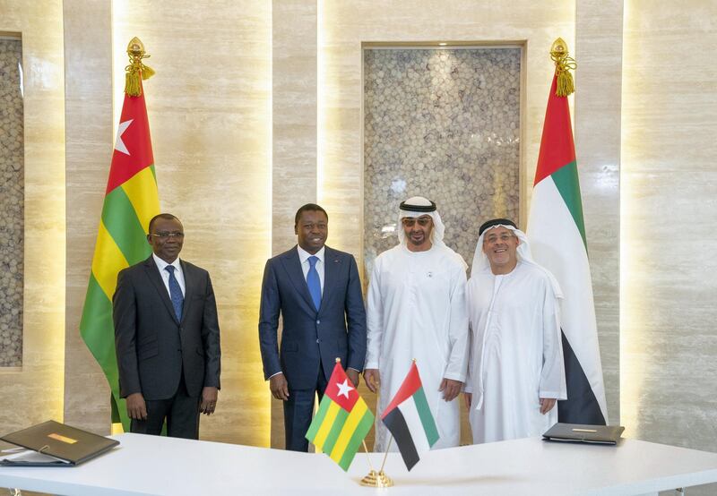 ABU DHABI, UNITED ARAB EMIRATES - March 11, 2019: HH Sheikh Mohamed bin Zayed Al Nahyan, Crown Prince of Abu Dhabi and Deputy Supreme Commander of the UAE Armed Forces (2nd R) and Faure Gnassingbé, Presdient of Togo (3rd R), stand for a photograph after  witnessing a signing ceremony between the Khalifa Fund and Togo's Ministry of Finance to fund small and medium-sized enterprise in Togo worth AED 55 million. Seen withHE Hussain Al Nowais, Chairman of the Khalifa Fund to Support and Develop Small & Medium Enterprises (R), at Al Shati Palace.

( Mohamed Al Hammadi / Ministry of Presidential Affairs )
---