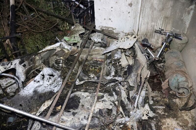 Debris of a vehicle inside a house compound after a US drone strike in Kabul. AP Photo