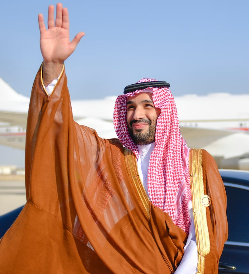 Saudi Crown Prince Prince Mohammed bin Salman waves farewell to Sheikh Mohamed.
