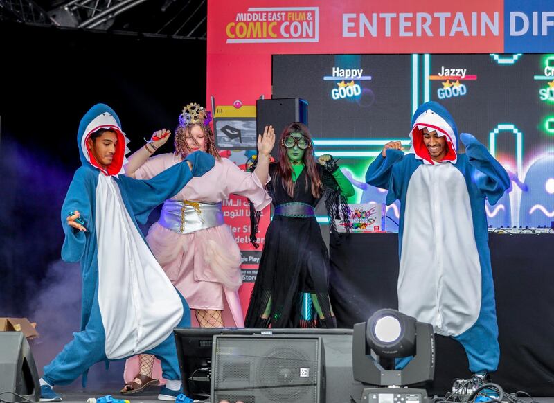 Dubai, April 12, 2019.  MEFCC day 2-
Comic Con goers at full swing on day 2.  The baby sharks win the Nintendo home system. 
Victor Besa/The National.
Section:  AC  
Reporter:  Chris Newbould