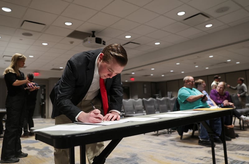 A man takes part in the Republican presidential caucus, in West Des Moines, Iowa. Reuters