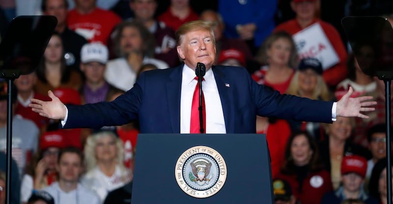 President Donald Trump speaks on a number of topics including his administration's successes during a Keep America Great Rally in Tupelo, Miss., days before the Nov. 5 general elections in Mississippi. AP