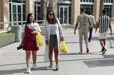 The average UAE shopper uses about 1,100 plastic bags each year - compared to the global average of 300, according to official estimates. The new measures will force retailers to charge and encourage the public to ditch them. Pawan Singh / The National