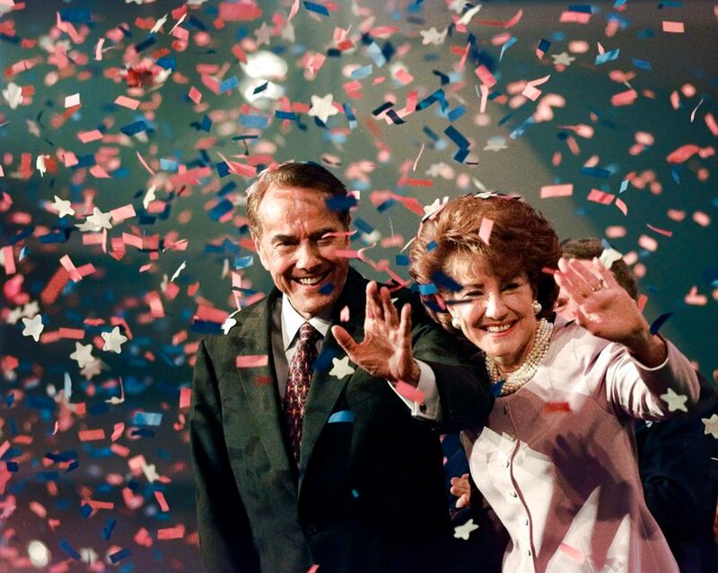 Bob Dole and his wife Elizabeth wave from the podium at the Republican National Convention in San Diego, after he accepted the 1996 Republican presidential nomination for a race he lost to Bill Clinton. Dole has died, aged 98. AP