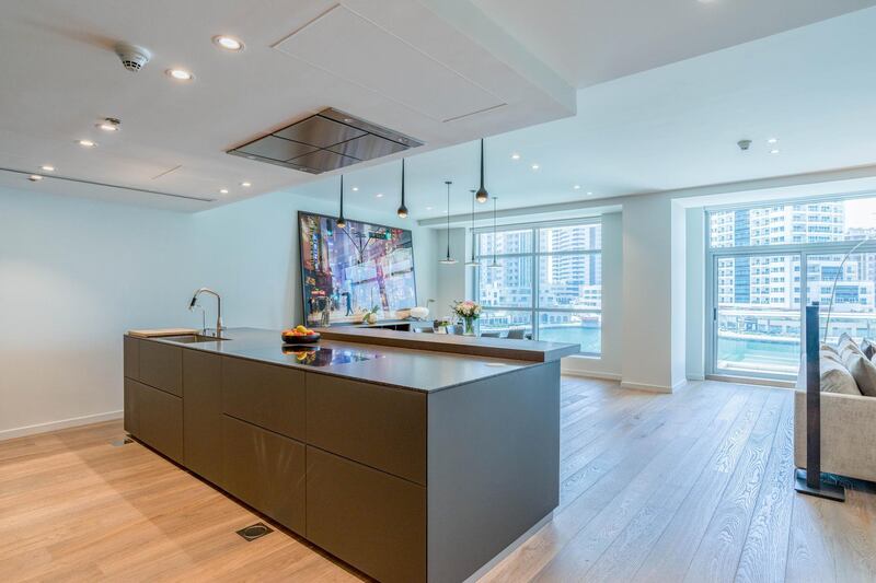 <p>The open kitchen features Miele appliances.&nbsp;Courtesy LuxuryProperty.com</p>
