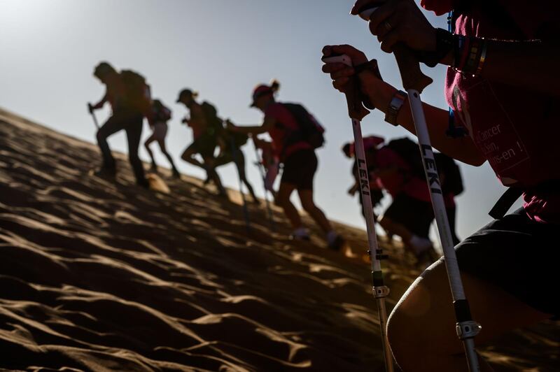 Women take part in the desert trek, Rose Trip Maroc, the Erg Chebbi near Merzouga. AFP
