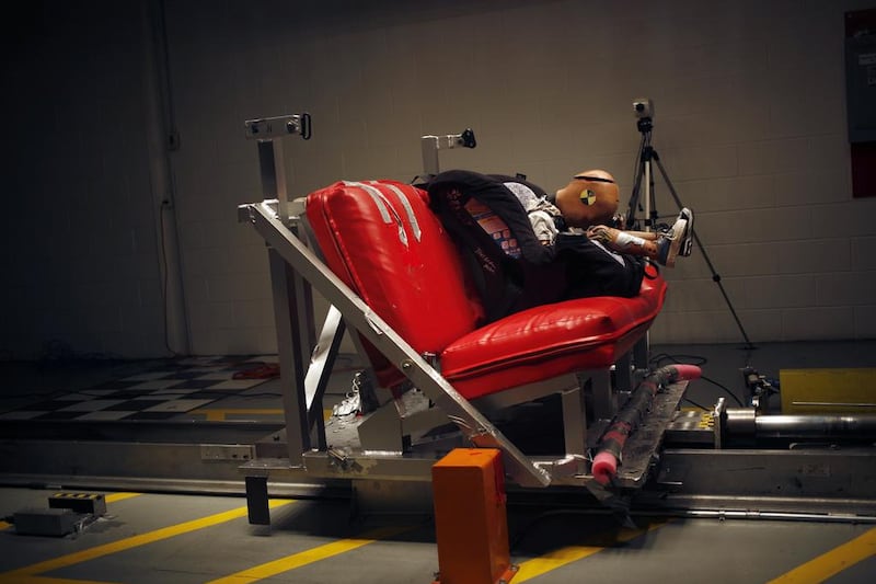 A child seat undergoes a 55kph crash test at a testing facility in the United States. A properly fitted child seat in a car can save a child’s life in the event of a crash, yet many Emirati parents fail to use them. Luke Sharrett / Bloomberg