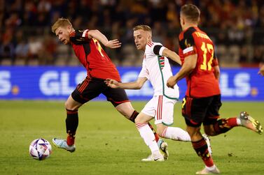 Belgium's Kevin De Bruyne (L) in action against Joe Morrell (C) of Wales during the UEFA Nations League soccer match between Belgium and Wales in Brussels, Belgium, 22 September 2022.   EPA / STEPHANIE LECOCQ
