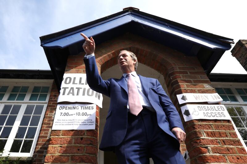 BIGGIN HILL, UNITED KINGDOM - MAY 23: Brexit Party leader Nigel Farage poses for photographers as he arrives to vote in the European Elections, at a polling station on May 23, 2019 in Biggin Hill, United Kingdom. Polls are open for the European Parliament elections. Voters will choose 73 MEPs in 12 multi-member regional constituencies in the UK with results announced once all EU nations have voted. (Photo by Dan Kitwood/Getty Images) *** BESTPIX ***