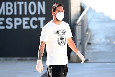 Barcelona star Lionel Messi wears a protective face mask at the club's training ground after returning to training. AP