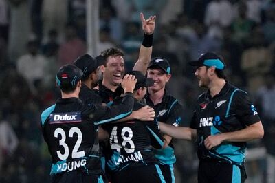 Matt Henry, centre, took a hat-trick for New Zealand but it wasn't enough to avoid a heavy defeat. AP