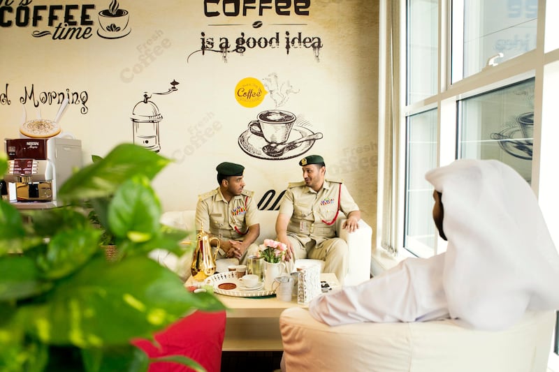 Police officers take a coffee break inside their newly renovated headquarters. All photos by Reem Mohammed / The National