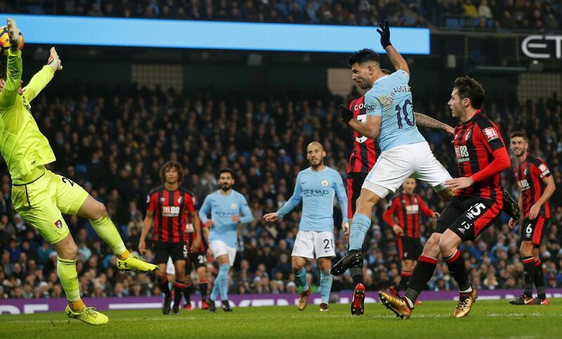 Soccer Football - Premier League - Manchester City vs AFC Bournemouth - Etihad Stadium, Manchester, Britain - December 23, 2017   Manchester City's Sergio Aguero scores their third goal                 REUTERS/Andrew Yates    EDITORIAL USE ONLY. No use with unauthorized audio, video, data, fixture lists, club/league logos or "live" services. Online in-match use limited to 75 images, no video emulation. No use in betting, games or single club/league/player publications.  Please contact your account representative for further details.