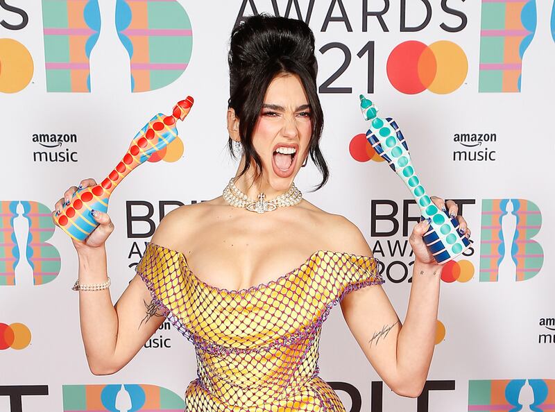 epa09192546 A handout photo made available by the Brit Awards shows Dua Lipa at the Brit Awards 2021 at the O2 Arena in Greenwich, Greater London, Britain, 11 May 2021. It is the 41st edition of the British Phonographic Industry's annual pop music awards.  EPA/JOHN MARSHALL / HANDOUT NO TV / NO USE AFTER 08 JUNE 2021 / MANDATORY CREDIT: JOHN MARSHALL HANDOUT EDITORIAL USE ONLY/NO SALES/NO ARCHIVES