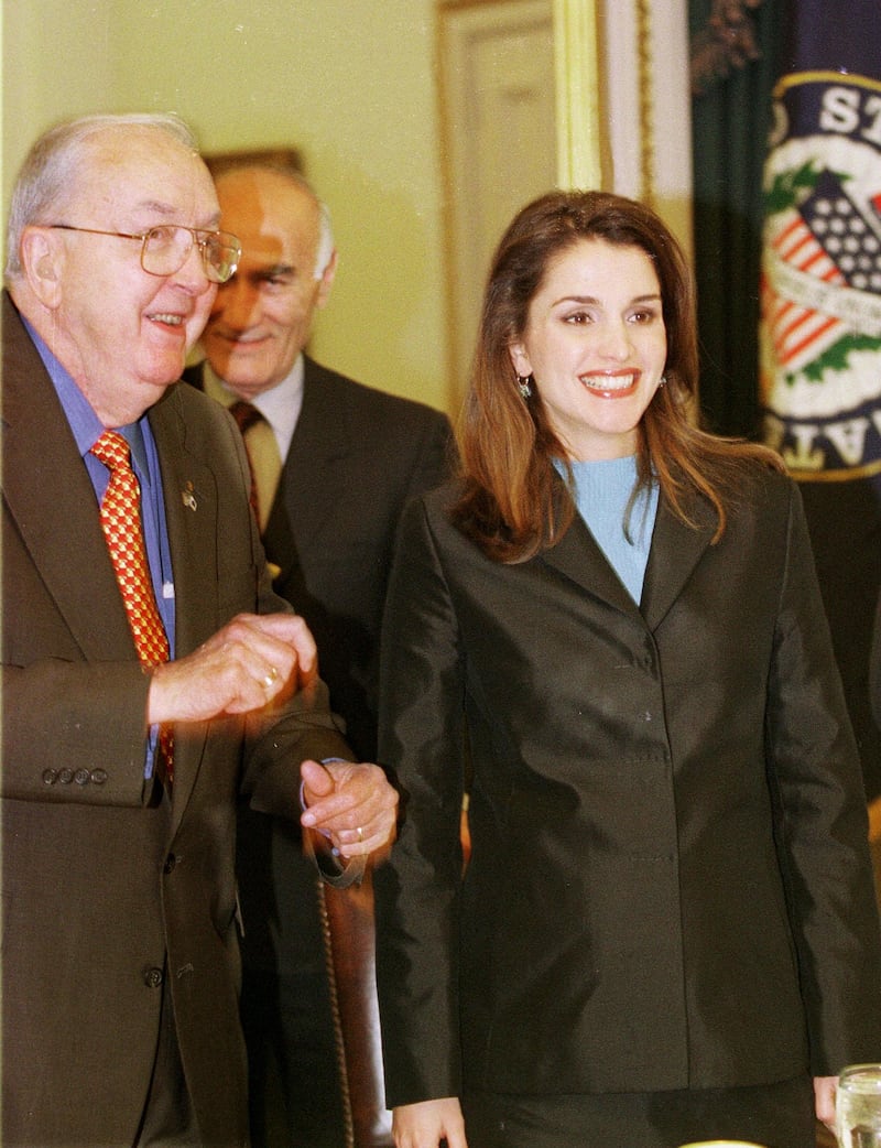 370613 03: Queen Rania of Jordan laughs with Senator Jesse Helms during a meeting on Capitol Hill, June 7, 2000 in Washington. (Photo by Michael Smith/Newsmakers)