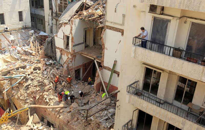 Rescue team search through rubble of buildings damaged due to the massive explosion at Beirut's port area, in Gemmayze, Lebanon. REUTERS