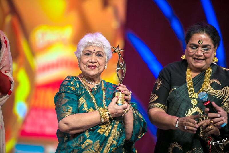 Actress Sowcar Janaki (centre) accepts a lifetime achievement award at the Siima awards in Sharjah. Picture courtesy of Siima