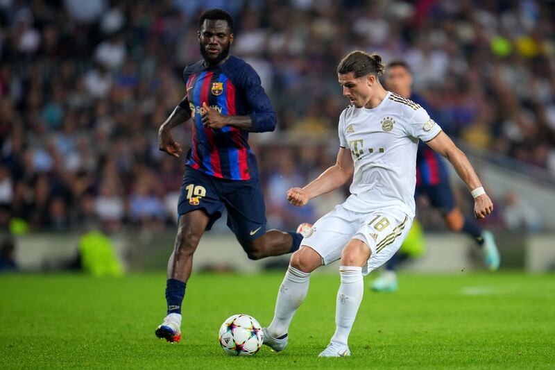 Marcel Sabitzer is challenged by Barca's Franck Kessie. Getty