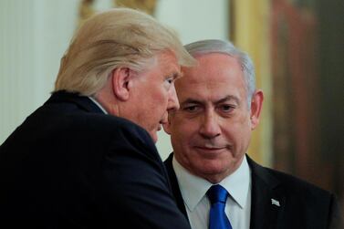 US President Donald Trump and Israel's Prime Minister Benjamin Netanyahu talk in the midst of a joint news conference on a new Middle East peace plan proposal in January. Reuters