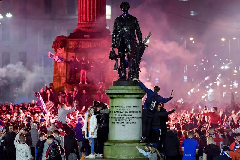 Rangers fans gather in George Square in Glasgow to celebrate the club winning the Scottish Premiership for the first time in 10 years. Getty