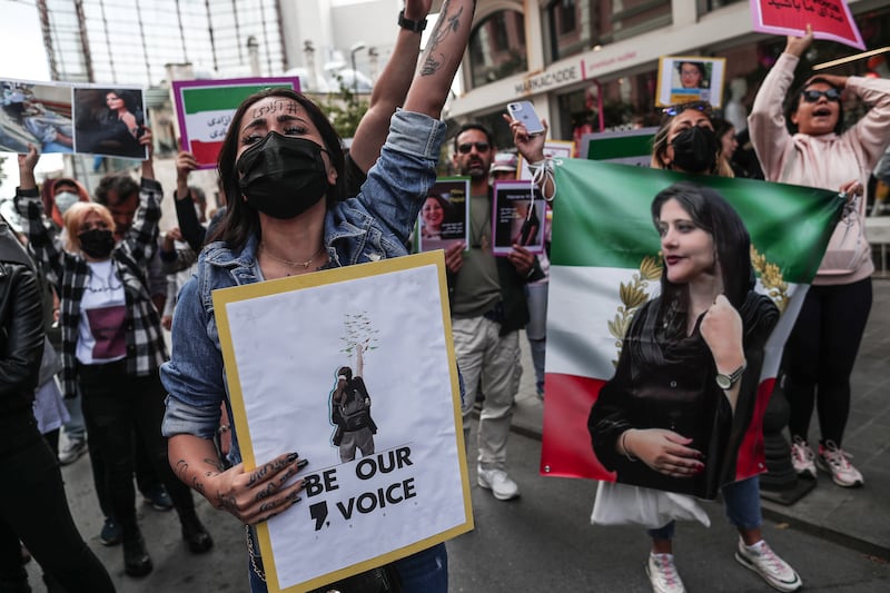 Iranian protesters shout slogan during a protest in Istanbul, Turkey. EPA
