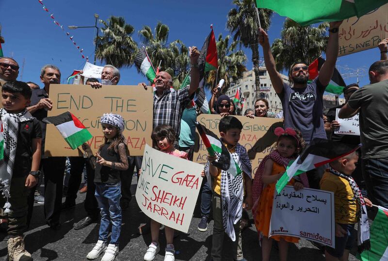 Palestinians demonstrate in the city of Ramallah, in the occupied West Bank. AFP