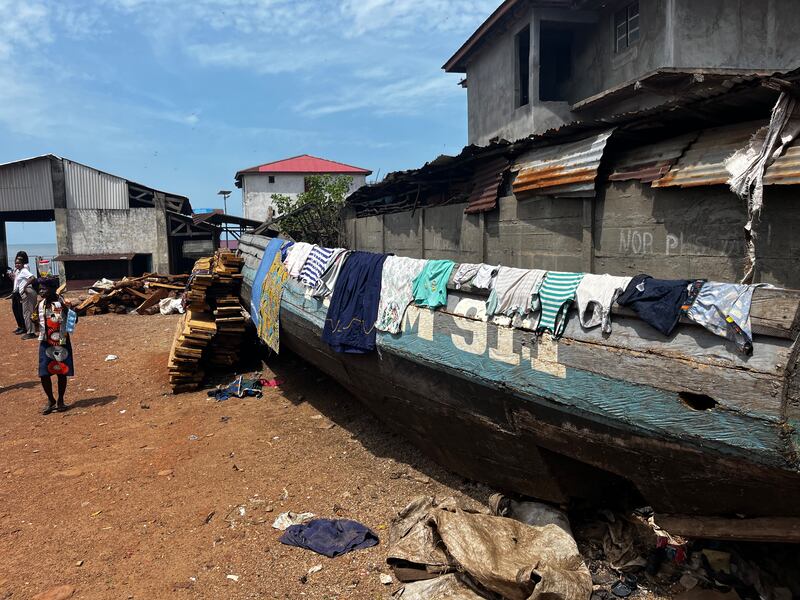 Washing drying on a damaged fishing boat. Nick Webster / The National